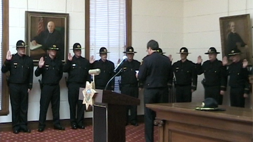 Half Moon Bay police are sworn in as San Mateo County sheriff's deputies on June 14, 2011.