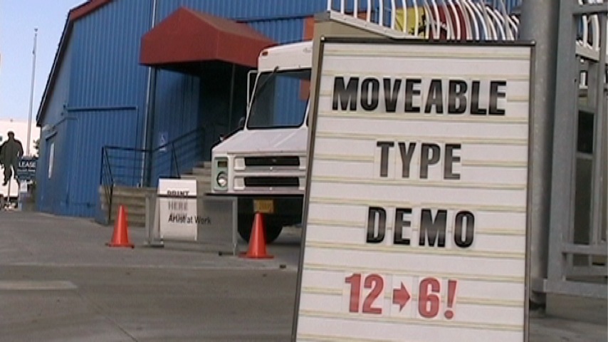 sign for a letterpress printing van outside the San Francisco Center for the Book